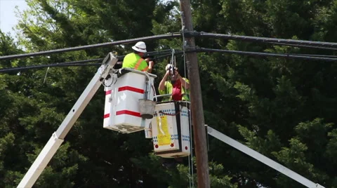 1966 Men Working on Power Lines in Slow Motion 스톡 동영상 40480819