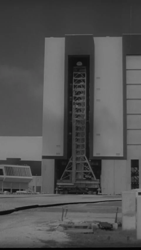 1966 - A Saturn rocket is prepared for launching at Cape Kennedy. Stock Footage 287572178