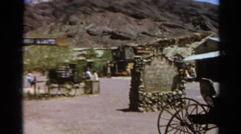 1966: tourists walking through an old western town CALIFORNIA Stock Footage