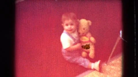 1966:ATHENS OHIO USA. Boy With Teddy Bear On Lawn Stock Photos