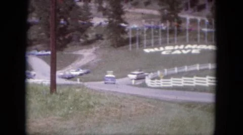 1966:SOUTH DAKOTA USA.Driving On A Road Man Walking Out Of Saloon Doors Stock Photos