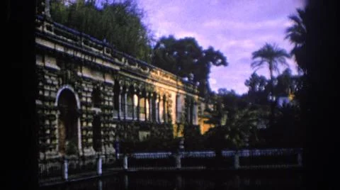 1966:SPAIN. An Old Aztec Structure Surrounded By Beautiful Green Palm Trees Fotos de archivo