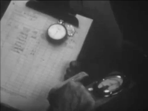 1967 _A supervisor briefs a RADEF staff at Emergency Operating Center during a Stock Footage