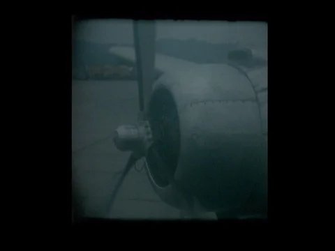 1967 Airplane propellers start,  plane taxies and takes off Stock Footage 72394979
