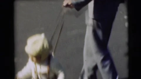 1967: baby on the road is active and doing nasty things with her mother CAMDEN, Stock Footage