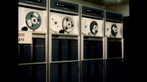 1967 - Computers at IRS service centers catch discrepancies in tax returns. Video stock 116259920