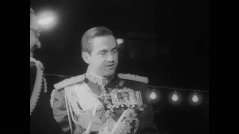 1967 - King Constantine oversees Easter traditions in Athens, Greece. Stock Footage 152532147