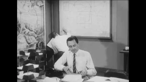 1967 An officer broadcasts information about a radiological hazard, and an Stock Footage 115546259