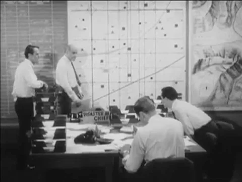 1967-An officer uses a map to explain what steps should be taken during a Stock Footage 79456349