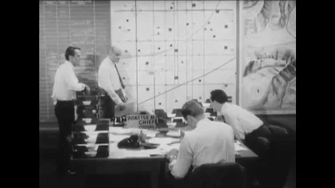 1967 An officer uses a map to explain what steps should be taken during a Stock Footage 115546472