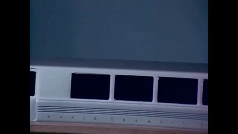 1967-Passengers board a BART train, drawings of a Bart station, a Barbie acts as Stock Footage 86408039