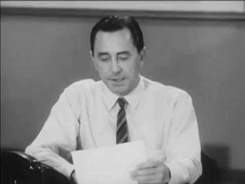 1967-A supervisor gives a forecast, and an analyst plots information during a Stock Footage 79456337
