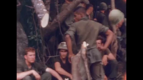 1967 - US Marines load wounded soldiers onto CH-46 helicopters in Vietnam. Video stock 113102450