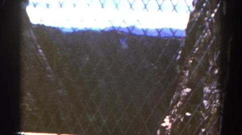 1967:COLORADO USA.Elevator Going Down Some Tall Mountain Behind A Gate Stock Photos