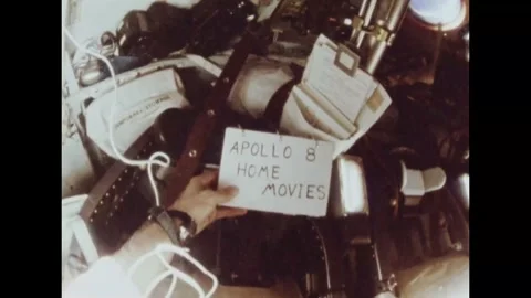 1968 - Apollo 8 astronauts Frank Borman and Bill Anders demonstrate the effect Stock Footage 232847019
