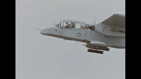 1968 - Forward Air Controllers and ground troops consult maps while coordinating Stock Footage 107738461
