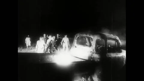 1968 - In this horror film, a horde of zombies feeds on the body parts of a dead Stock Footage