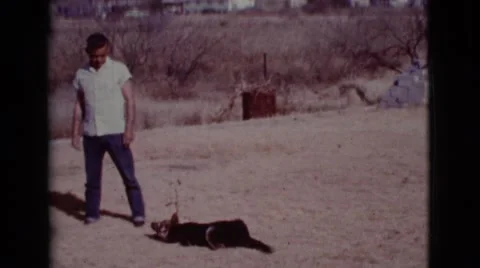 1968: Man Playing With His Dog In Cottonwood, Arizona Vidéo 67708139