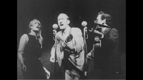 1968 - Mary Travers explains how folk music like Peter, Paul and Mary's hooks Stock Footage 124221483