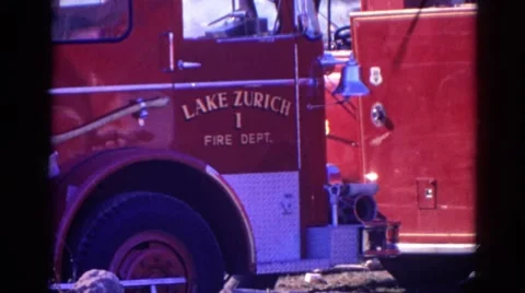 1968: a red fire engine with lake zurich printed on the side WAUCONDA, ILLINOIS Stock Footage