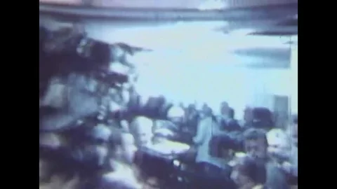 1968 - RFK lies dying in the crowded halls of the Ambassador Hotel. Video stock 116260071