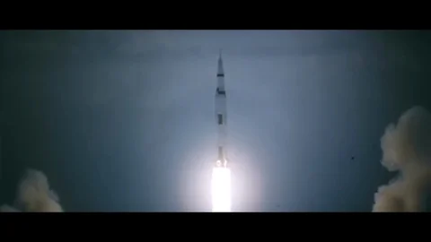 1968 - Spectators watch as Saturn V flies away from Cape Kennedy, Florida. Stock Footage 86136366