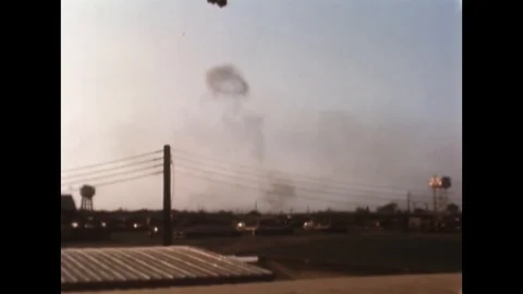 1968 - Vietnamese troops unload crates of ammo and transfer them onto a UH-1D Stock Footage 118604213