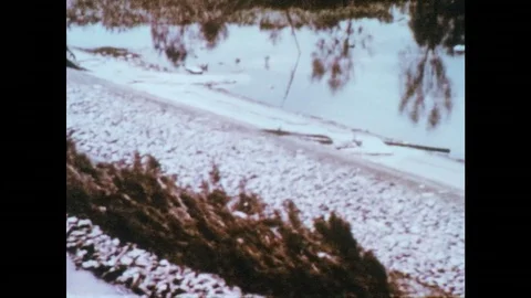 1969: Aerial view of aftermath along shoreline. Stock Footage 74852618