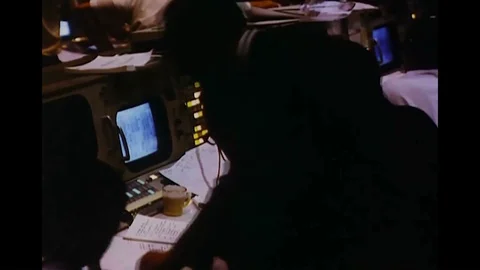 1969 - Apollo 11s lunar module successfully un-docks from the command module. Video stock 86908856