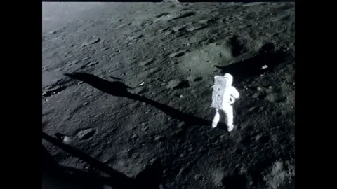 1969 - The Apollo 12 crew sets up base on the moon. Stock Footage 92625790