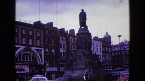 1969: a city is seen with tall buildings along a coastal area IRELAND Stock Footage