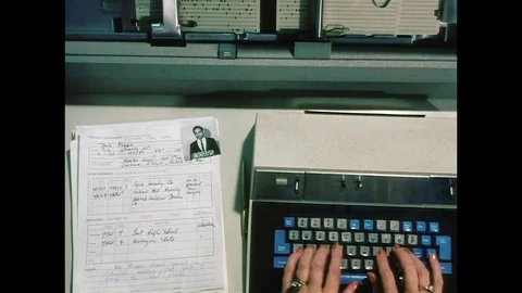 1969-Data Entry Clerk / Computer / Typing / USA / 1960 - 1969 Stock Footage 77878355
