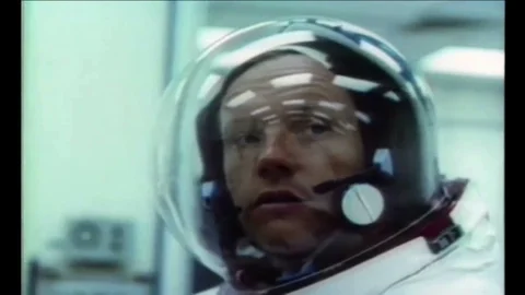 1969 - Neil Armstrong, Buzz Aldrin, and Michael Collins get in their spacesuits Stock Footage