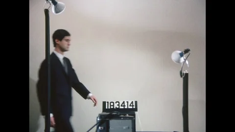 1969-Photographic Studio / Photographing / White Collar Workers / USA / 1960 - Stock Footage