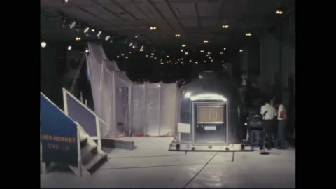 1969 - A US Air Force helicopter is wheeled into NASA's Mobile Quarantine Stock Footage 234501599