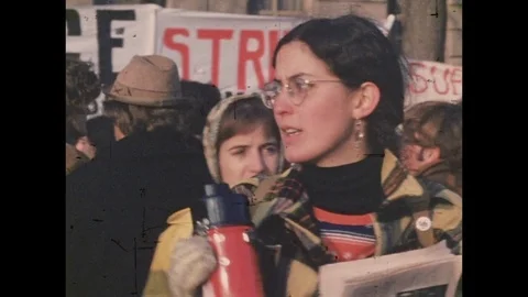 1969 WASHINGTON ANTI VIETNAM WAR PROTEST:megaphone woman Stock Footage