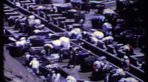 1969:INDIA.Somewhere In The Third World People Sorting Textiles Stock Photos