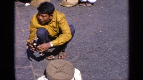 1970: Snake Charmer Performs With Cobra in India 動画素材 73036675