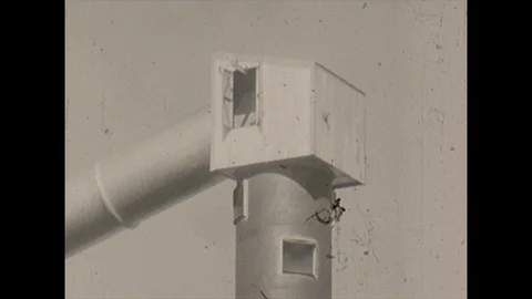 1970s: 16mm tilt down mining tower Stock Footage 129841747