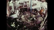 1970S: Astronaut Flips Into Room In Space Station. Astronaut Floats Up Into Stock Footage