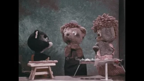 1970s: Cat and dog puppet talk to bear n... | Stock Video | Pond5