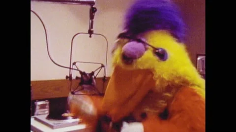 1970s: Chicken mascot works as DJ. Masco... | Stock Video | Pond5