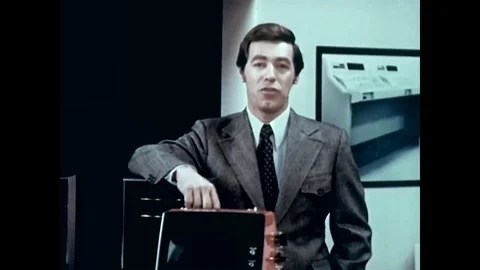 1970s clip of the making of a transistor and some office and lab scenes inside Stock Footage 107668487