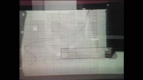 1970s: Computer prints graph.  Man gathers samples from shoe and motorcycle.  Video stock 160354580