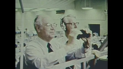 1970s: Crowd watches rocket launch. 動画素材 84734217
