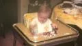 1970s CUTE Baby HIGHCHAIR EATS Messy Plays Food Cake Vintage Film Home Movie HD Footage