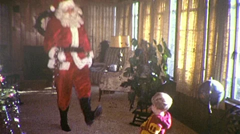 1970s DANCING Christmas SANTA and Little Boy Xmas Tree Vintage Film Home Movie Stock Footage