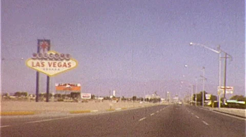 1970s Driving WELCOME TO LAS VEGAS Famous Sign Landmark Vintage Film Home Movie Stock Footage