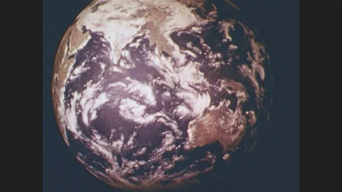 1970s: Earth rotates. View of Mars. Stock Footage 86694198