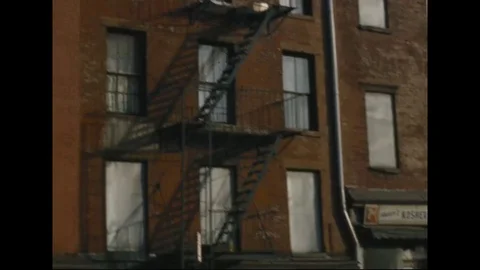 1970s, East Harlem infested with gangs, the use of drugs such as heroin unite Stock Footage 124272890
